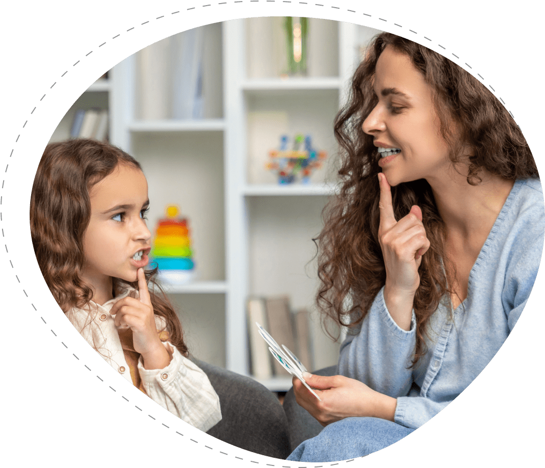 Woman and girl play a game with cards.